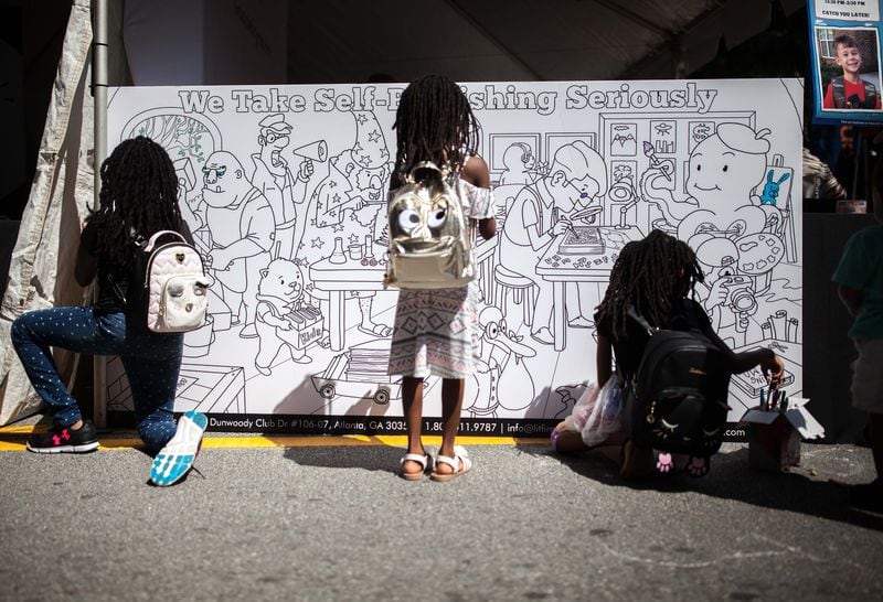 Children color at the 12th Annual AJC Decatur Book Festival last year. CONTRIBUTED BY BRANDEN CAMP