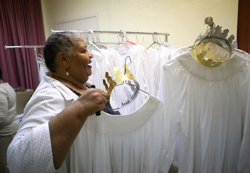 Jackie Herring works in the wardrobe room preparing costumes for pilgrims and angels for the 86th annual run of “Heaven Bound” at Big Bethel AME Church. Curtis Compton/ccompton@ajc.com