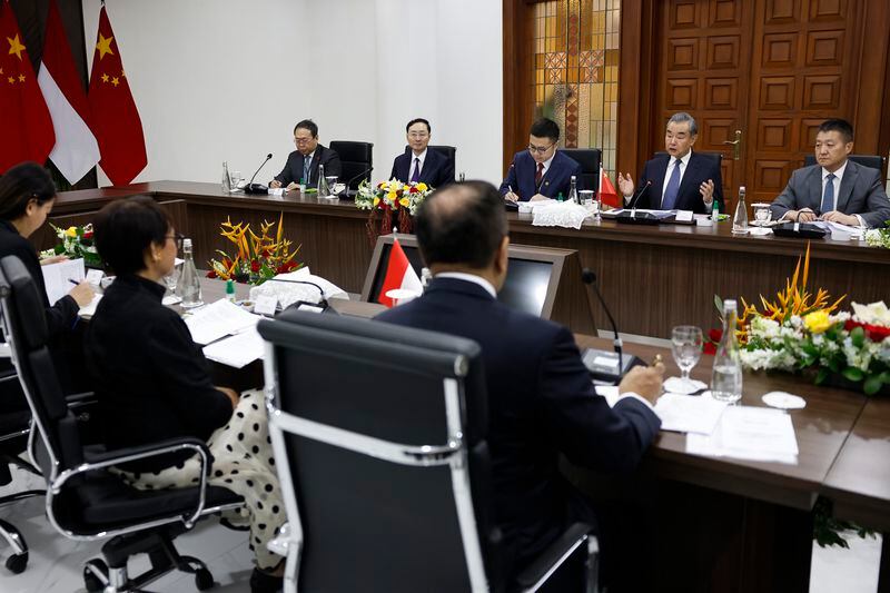Chinese Foreign Minister Wang Yi, second right, speaks during a bilateral meeting with Indonesian Foreign Minister Retno Marsudi, bottom second left, in Jakarta, Indonesia, Thursday, April 18, 2024. (Willy Kurniawan/Pool Photo via AP)
