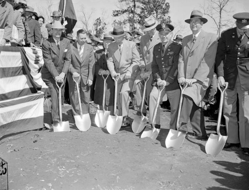 Gov. Herman Talmadge (far left) and Mayor William B. Hartsfield (fourth from left) join members of the U.S. Army Corps of Engineers in breaking ground on the Buford Dam on March 2, 1950. (Jimmy Fitzpatrick / AJC Archive at GSU Library AJCNS1950-03-00b)
