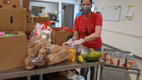Community Assistance Center works to prevent homelessness, alleviate hunger and promote self-sufficiency. One of its services includes a food pantry, which is supported by community volunteers. Courtesy of Community Assistance Center