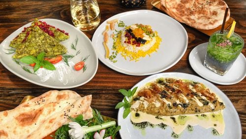 Plated dishes (from top left to bottom right) at Persian Basket Kitchen & Bar in Johns Creek: Koko Shevid Baghali (Fava Bean and Dill Frittata), Morasa Rice (Jeweled Rice) and Kashke Bademjaan (Roasted Eggplant). Styling by executive chef Ermiya Rezai / Chris Hunt/FOR THE AJC