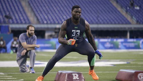Clemson defensive lineman Shaq Lawson runs a drill at the NFL football scouting combine on Tuesday, March 1, 2016, in Indianapolis. (AP Photo/Darron Cummings)