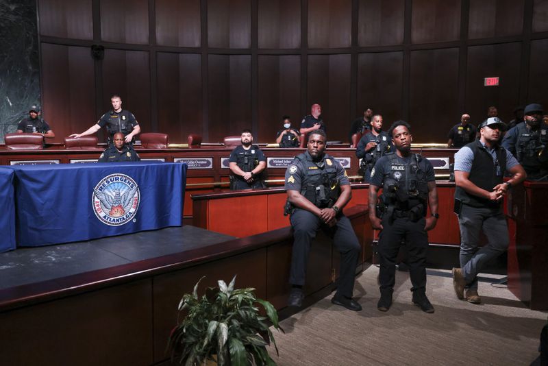 Members of the Atlanta Police Department protect the Atlanta City Council chambers after the council voted 11 to 4 to approve legislation to fund the training center, on Tuesday, June 6, 2023, in Atlanta. (Jason Getz / Jason.Getz@ajc.com)