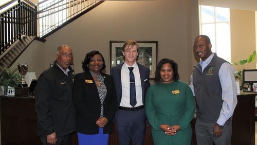 "MacGyver" star Lucas Till (middle) with (from left) Stockbridge Mayor Anthony Ford, Councilwoman Neat Robinson, Councilwoman LaKeisha Gantt and Councilman Elton Alexander.