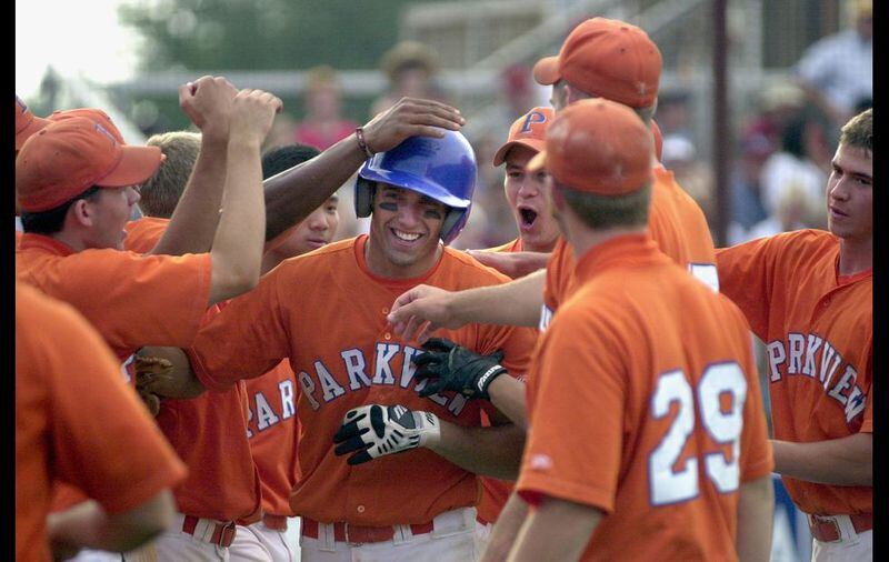 Francoeur is congratulated by Parkview High teammates after hitting a game-winning homer in 2002. (Sunny Sung/AJC file photo)