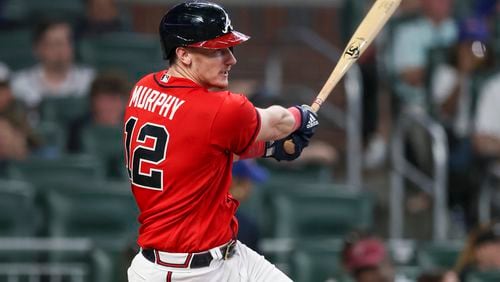 Sean Murphy follows through on an eighth-inning hit Friday, June 9, 2023 against the Nationals in Atlanta. (Jason Getz / Jason.Getz@ajc.com)