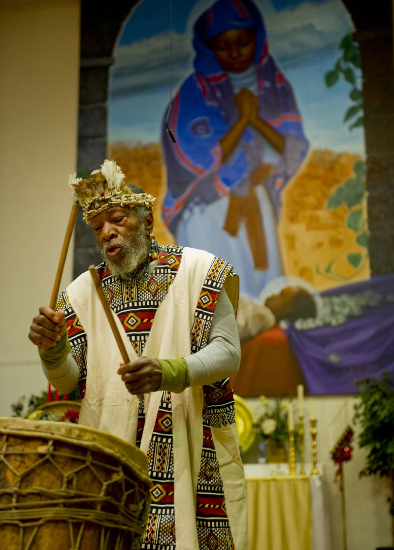 121226 Atlanta: Baba Atu plays during the drum call  at the beginning of Kwanzaa during the celebration of Umoja or Unity at the Shrine of the Black Madonna in Atlanta on Wednesday, December 26, 2012. Kwanzaa lasts seven days and celebrates different aspects of African and Carribean culture.   Jonathan Phillips Special