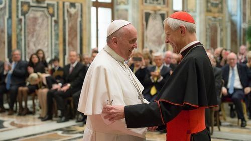 In this file photo, Pope Francis (left) talks with Papal Foundation Chairman Cardinal Donald Wuerl, archbishop of Washington, D.C., during a meeting with members of the Papal Foundation at the Vatican. Earlier this month, a Pennsylvania grand jury accused Wuerl of helping to protect abusive priests when he was Pittsburgh’s bishop. A Pew Research Center survey in January found a drop (from 55 percent to 45 percent) in the share of U.S. Catholics who give the pope “excellent” or “good” marks for his handling of the sex abuse scandal. L’OSSERVATORE ROMANO / POOL PHOTO VIA AP