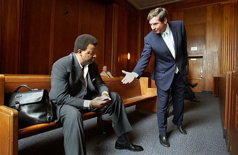 Atlanta Hawks General Manager Billy Knight, left, refused to shake hands with Steve Belkin, one owner of the Hawks, inside Suffolk Superior Courthouse, Tuesday, Aug. 9, 2005, in Boston. A move by the other ASG partners to force Belkin out resulted in a long lawsuit. In 2010, the group bought out Belkin's ownership share in Atlanta Spirit. In 2011, ASG sold the Atlanta Thrashers and the team was moved to Winnipeg.