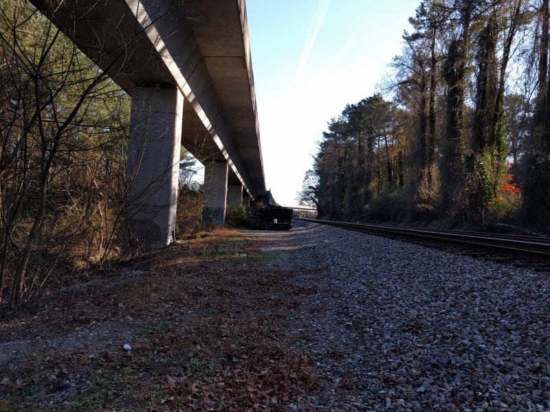Dec. 22, 2016, Atlanta -- Trains and automobiles: The PATH400 Greenway Trail will squeeze between Ga. 400 and these railroad tracks -- the elevated Red MARTA line and a freight rail line.
