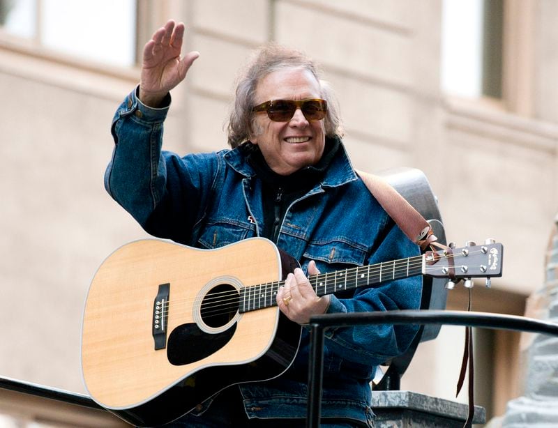 Don McLean rides a float in the Macy's Thanksgiving Day Parade in New York. Feb. 22, 2019. He'll play the Brookhaven Cherry Blossom Festival this weekend. (AP Photo/Charles Sykes, File)
