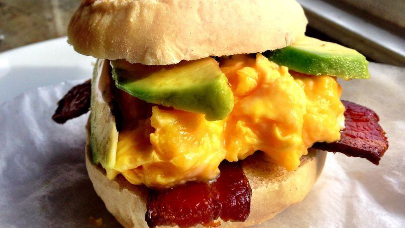 The Egg McMuff at 8arm is loaded with soft scrambled egg, avocado, bacon and cilantro-Tabasco mayo. (Wyatt Williams)