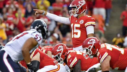 Kansas City Chiefs quarterback Patrick Mahomes directs the line on his first play of the game in the first quarter against the Houston Texans on Thursday, Aug. 9, 2018, at Arrowhead Stadium in Kansas City, Mo. (John Sleezer/Kansas City Star/TNS)