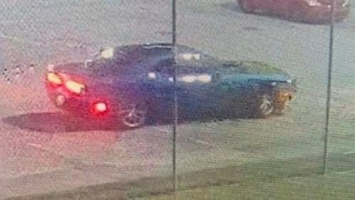 Investigators believe the driver of a blue Dodge Challenger helped the inmates flee from the Bibb County Jail last month.