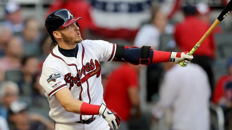 Braves third baseman Josh Donaldson hits a solo home run against the St. Louis Cardinals during Game 5 of the NLDS at SunTrust Park on Wednesday, October 9, 2019 in Atlanta. Curtis Compton/ccompton@ajc.com