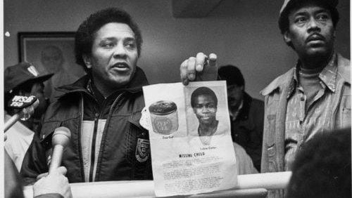 AJC File PhotoAt the West Hunter Street Baptist Church, Atlanta Police Chief Eldrin Bell holds up a photo of missing child, Lubie 'Chuck' Geter in this 1981 photo