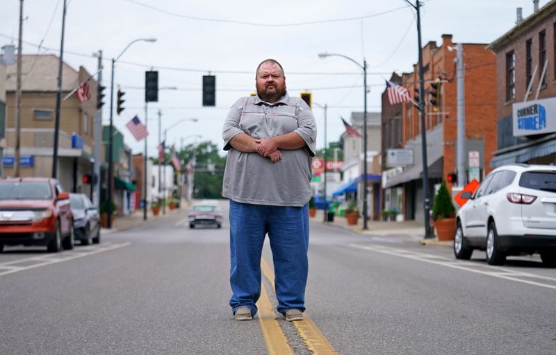 East Palestine, Ohio Mayor Trent Conaway poses for a photo on Market Street, Saturday, July 15, 2023, in East Palestine. (Matt Freed for the Atlanta Journal Constitution)
