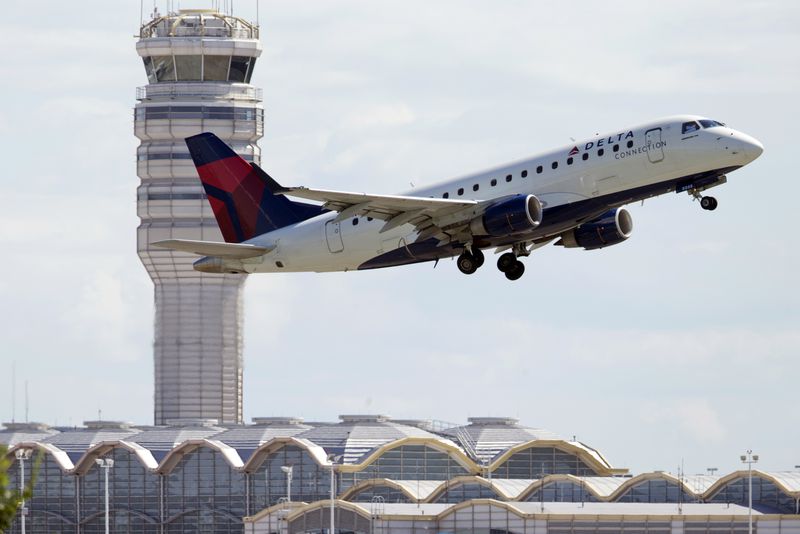 A Delta Air Lines jet takes off from Ronald Reagan Washington National Airport in Arlington, Va. 