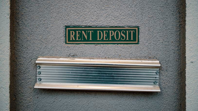 A rent deposit slot at an apartment complex in Tucker. (Melissa Golden/The New York Times)