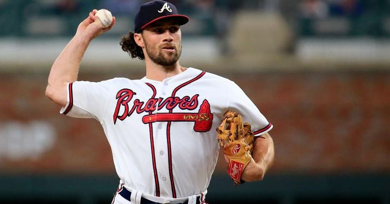 Charlie Culberson pitches for the Braves during the ninth inning against the Colorado Rockies at SunTrust Park on Friday night. (Daniel Shirey/Getty Images)