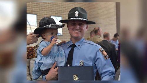 Georgia State Patrol Trooper Tyler Parker was killed in a single-vehicle crash Monday night, according to the Georgia Department of Public Safety. His daughter was critically injured.
