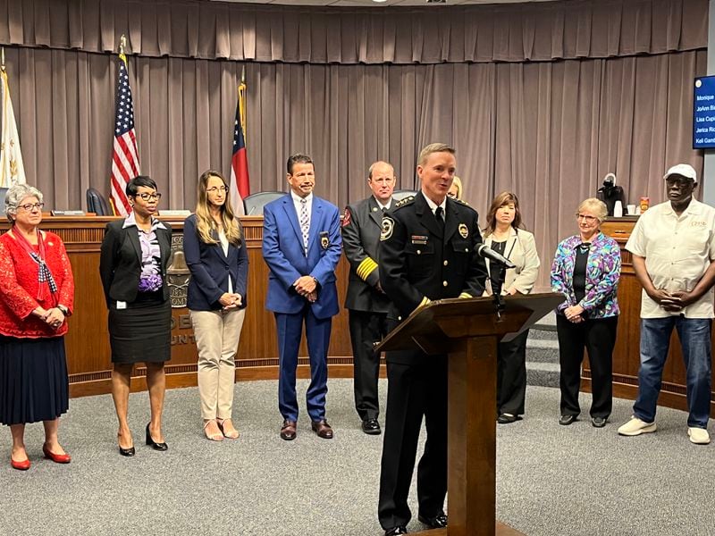 New Cobb Police Chief Stuart VanHoozer addresses the media after the Board of Commissioners voted unanimously to approve his appointment on May 10, 2022, in Marietta.
