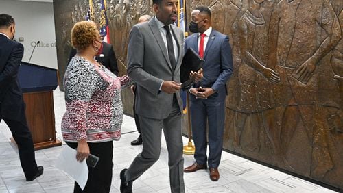 Mayor Andre Dickens leaves a press conference at Atlanta City Hall on Thursday, February 3, 2022. Dickens announced an agreement had been reached with the Integral Group. (Hyosub Shin / Hyosub.Shin@ajc.com)
