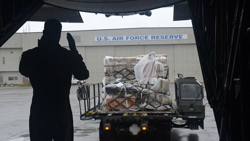 Members from Dobbins Air Reserve Base load supplies heading for Homestead Air Reserve Base in Florida's Miami-Dade County.
