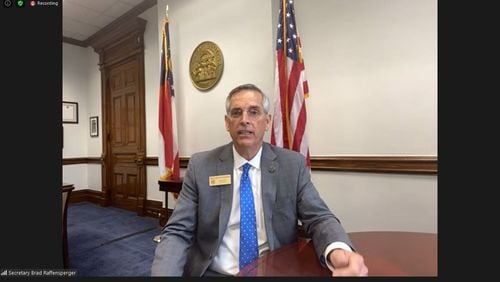 Georgia Secretary of State Brad Raffensperger answers questions from the state's Republican congressional delegation during an online elections roundtable meeting Monday.