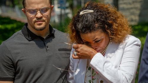 Johnny Bolton's sister Daphne Bolton becomes emotional at a press conference in front of the Cobb County sheriff's office in Marietta on Tuesday, May 25, 2021.  STEVE SCHAEFER FOR THE ATLANTA JOURNAL-CONSTITUTION