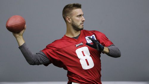 In this Oct. 17, 2019, photo, Philadelphia Eagles practice squad quarterback Kyle Lauletta throws a pass during an interview with The Associated Press at the NFL football team's training facility in Philadelphia. (AP Photo/Matt Rourke)