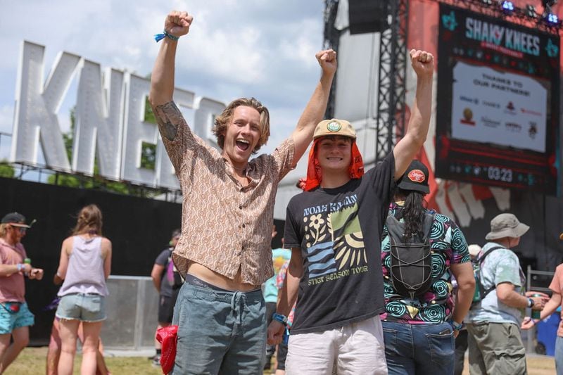 Thomas Fitzpatrick and James Finnegan pose in front of the iconic Shaky Knees sign on the first day of the festival Friday, May 3, 2024. (Riley Bunch/The Atlanta Journal-Constitution)
