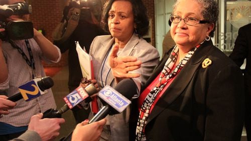 Beverly Hall, then the Atlanta schools superintendent, faces reporters after a 2011 school board meeting that focused on test-cheating allegations. CURTIS COMPTON / CCOMPTON@AJC.COM