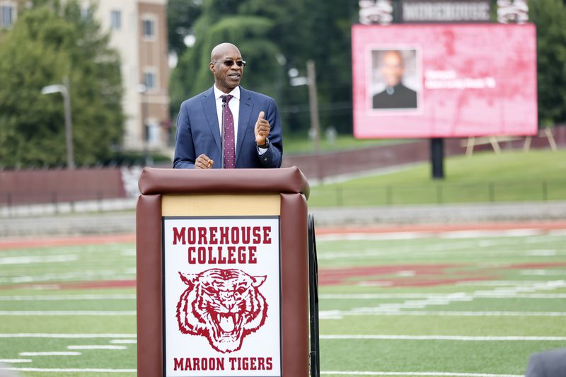 Edwin Moses speaks to guests during the dedication of the newly renovated Edwin C. Moses Track & B.T. Harvey Stadium Football Field at Morehouse College in Atlanta on Tuesday, August 23, 2022. “I must have broken into every track in the city, but I did whatever it took to win,” Moses said.