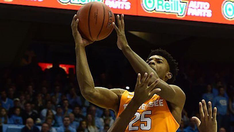 Tennessee’s Shembari Phillips shoots over North Carolina’s Isaiah Hicks in a December 11, 2016 game between Tennessee and North Carolina in Chapel Hill, N.C. (Getty Images)