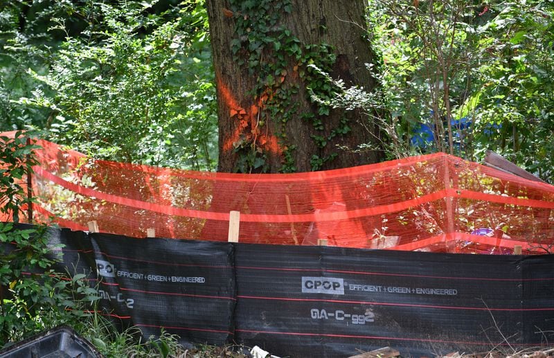September 8, 2022 Atlanta - Photo shows trees marked for removal on a property in Reynoldstown on Thursday, September 8, 2022. (Hyosub Shin / Hyosub.Shin@ajc.com)