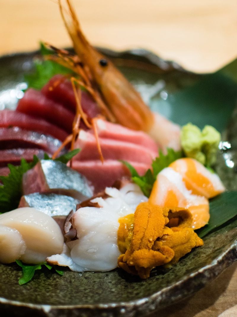 Sashimi taku jyo at Sushi Hayakawa is a selection of sashimi that included bigeye tuna, fatty tuna (toro) and sea urchin roe (uni). CONTRIBUTED BY HENRI HOLLIS