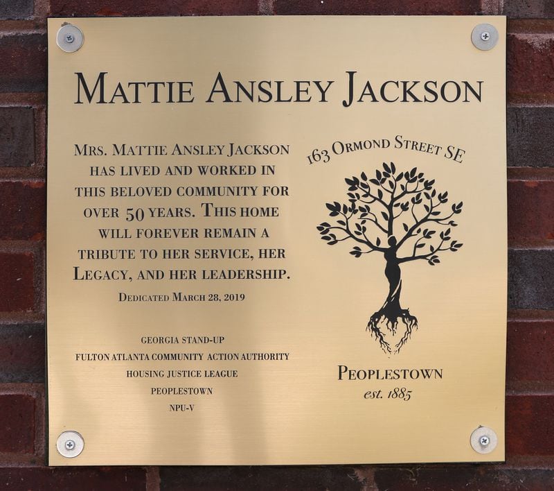 Neighbors paid for this plaque on Mattie Ansley Jackson’s house.  Bob Andres / robert.andres@ajc.com