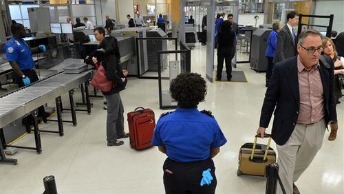TSA agents getting paid in Atlanta. (AJC file photo)