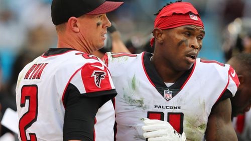 November 5, 2017 Charlotte: Falcons wide receiver Julio Jones and quarterback Matt Ryan react on the sidelines after Jones dropped a certain touchdown pass in the endzone during the fourth quarter against the Panthers in a NFL football game on Sunday, November 5, 2017, in Charlotte. The Panthers held on to beat the Falcons 20-17. Curtis Compton/ccompton@ajc.com