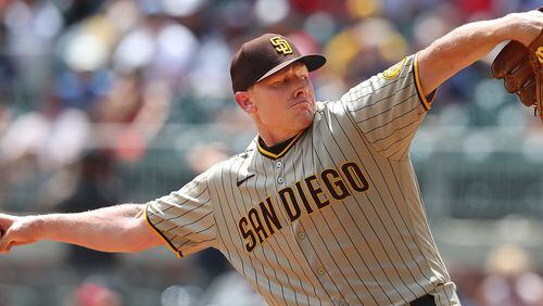 Former Atlanta Braves closer Mark Melancon finishes off the win for the Padres in the 7th inning to secure the 3-2 victory.   Curtis Compton / Curtis.Compton@ajc.com