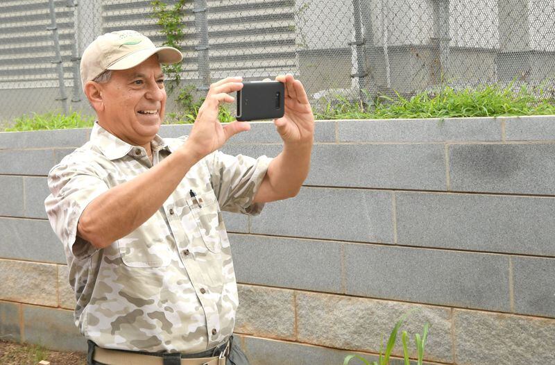 Steve Saenz, founder of and tour guide for Urban Explorers of Atlanta, takes photos on the Atlanta Beltline’s Westside Trail on Aug. 2, 2017, while the area is still under construction. The Westside Beltline is set to open this fall, and tours show the work underway. CONTRIBUTED BY REBECCA BREYER