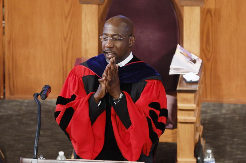 U.S. Sen. Raphael Warnock often refers to himself as a "senator-reverend." Splitting the two would almost be “like asking me is there a moment when I’m a man or a Christian or African American,” he said. “I’m all of those things. I’m a pastor. I’m a senator. I will tell you that my favorite job is father.” (Miguel Martinez /miguel.martinezjimenez@ajc.com)