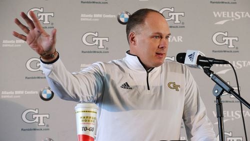 Georgia Tech head football coach Geoff Collins takes questions during a media session at Bobby Dodd Stadium on Thursday,  Jan. 10, 2019, in Atlanta.