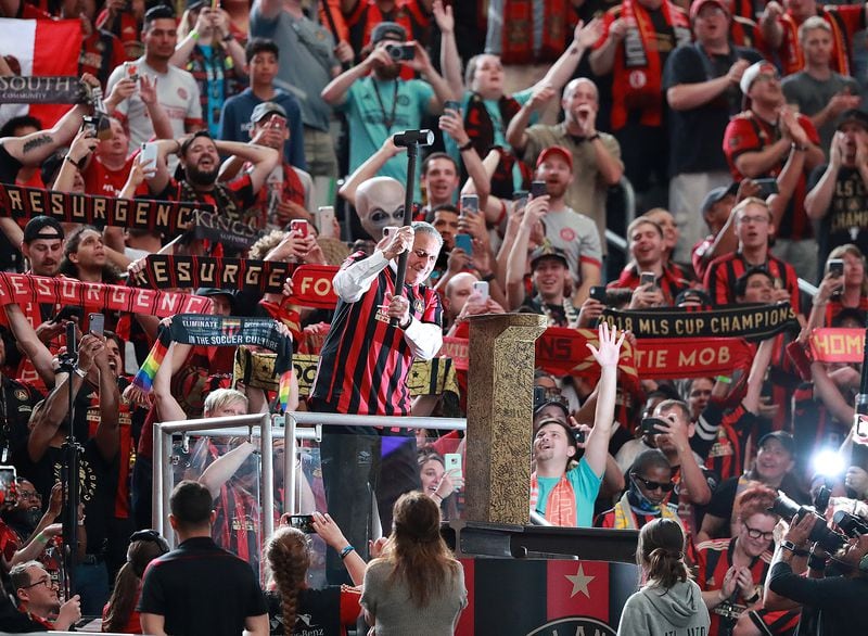 May 12, 2019 Atlanta: The fans cheer Atlanta United owner Arthur Blank as he hammers the golden spike to begin the game against Orlando City in a MLS soccer match on Sunday, May 12, 2019, in Atlanta. Blank also owns the Atlanta Falcons. Curtis Compton/ccompton@ajc.com