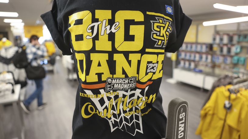 T-shirts are shown for purchase at the KSU bookstore ahead of Kennesaw State's first-round NCAA Tournament game against Xavier, which is scheduled Friday in Greensboro, North Carolina. (Jason Getz / Jason.Getz@ajc.com)