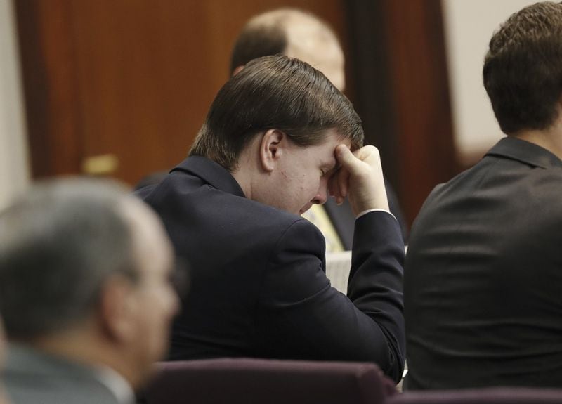 Leanna Taylor cries as attorney Maddox Kilgore shows photographs of her son Cooper to the jury during the murder trial for her ex-husband, Justin Ross Harris, in Brunswick on Monday. (AP Photo/John Bazemore, Pool)