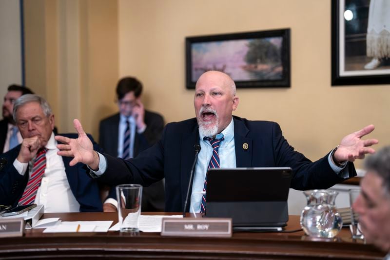 Rep. Chip Roy, R-Texas, joined at left by Rep. Ralph Norman, R-S.C., argues a point as the House Rules Committee prepares an emergency foreign aid package for Israel, Ukraine and Taiwan, at the U.S. Capitol in Washington, Thursday, April 18, 2024. (AP Photo/J. Scott Applewhite)