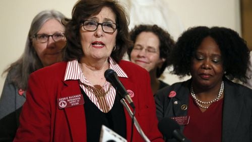 State Rep. Debbie Buckner, D-Junction City, leads off a press conference Tuesday about legislation that would remove Georgia’s tax on menstrual products. Bob Andres / bandres@ajc.com